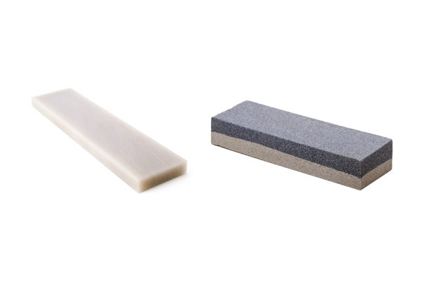 Sharpening whetstones: arkansas (left) and waterstone (right).