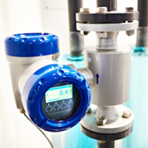 An electromagnetic flow meter in a water pipe system.