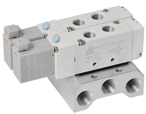 Pneumatic solenoid valves on a single piece design manifold