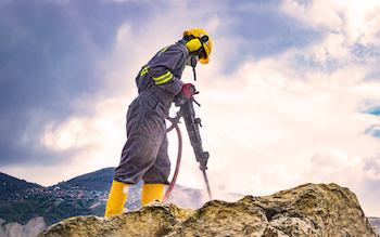 Pneumatic drill in construction site