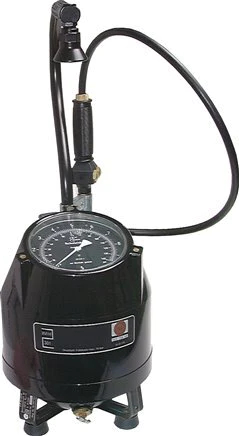 Portable tire inflator with pressure gauge